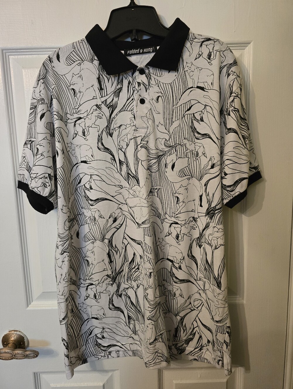 Folded & Hung Black & White Botanical Animal Print Polo